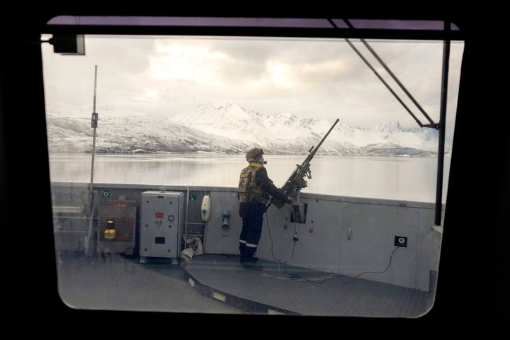 A French sailor is seen on the French navy frigate Normandie.