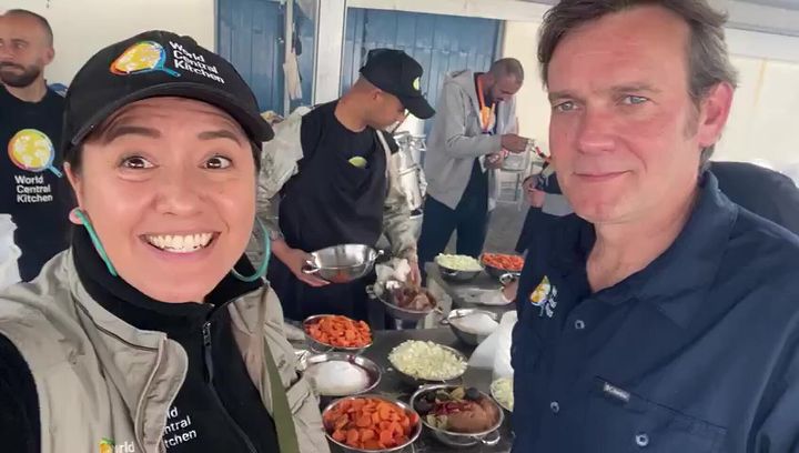 Australian Lalzawmi "Zomi" Frankcom (L) and Chef Oli (R), employees of aid organization World Central Kitchen (WCK), are seen in a video taken before Israel killed seven of the charity's workers in Deir al-Balah, Gaza on April 2, 2024. Frankcom has been confirmed to be one of the victims.