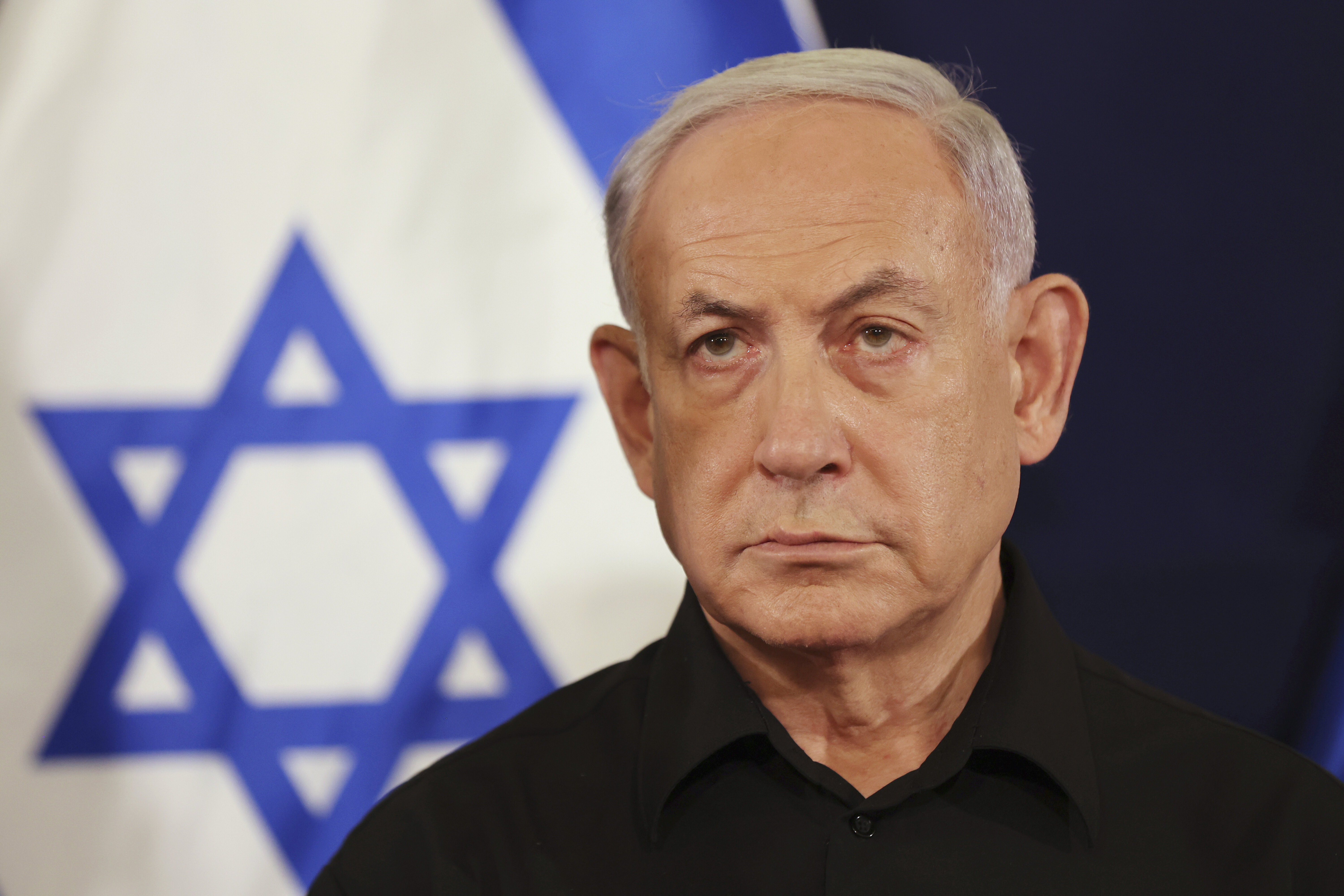 FILE - Israeli Prime Minister Benjamin Netanyahu attends a press conference with Defense Minister Yoav Gallant and Cabinet Minister Benny Gantz in the Kirya military base in Tel Aviv, Israel, Saturday, Oct. 28, 2023. (Abir Sultan/Pool Photo via AP, File)