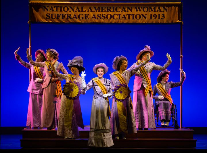 Jenn Colella, center, is pictured with the "Suffs" ensemble.