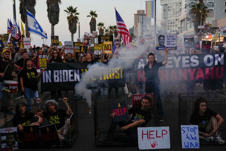 Demonstrators wave signs during a protest calling for the release of the hostages from Hamas captivity in the Gaza Strip, outside of the U.S. Embassy Branch Office in Tel Aviv, Israel, on June 3, 2024.