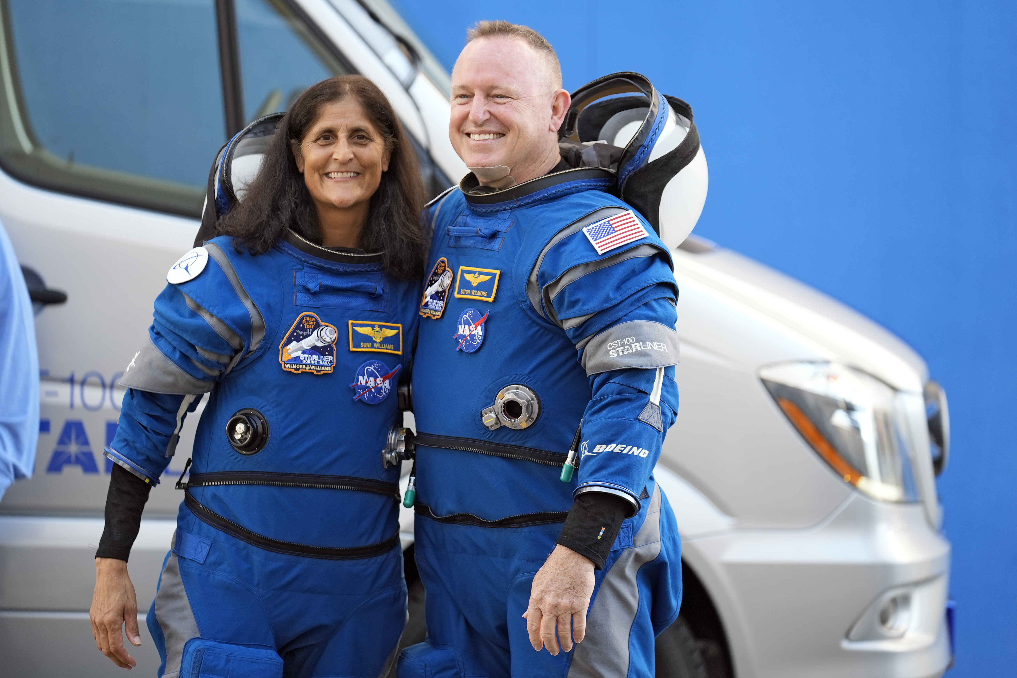 NASA astronauts Suni Williams, left, and Butch Wilmore pose for a photo after leaving the operations and checkout building for a trip to the launch pad on June 5, 2024, in Cape Canaveral, Fla.