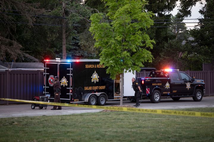 Police investigate the scene of a shooting at the Brooklands Plaza Splash Pad on June 15, 2024 in Rochester Hills, Michigan. (Photo by Bill Pugliano/Getty Images)