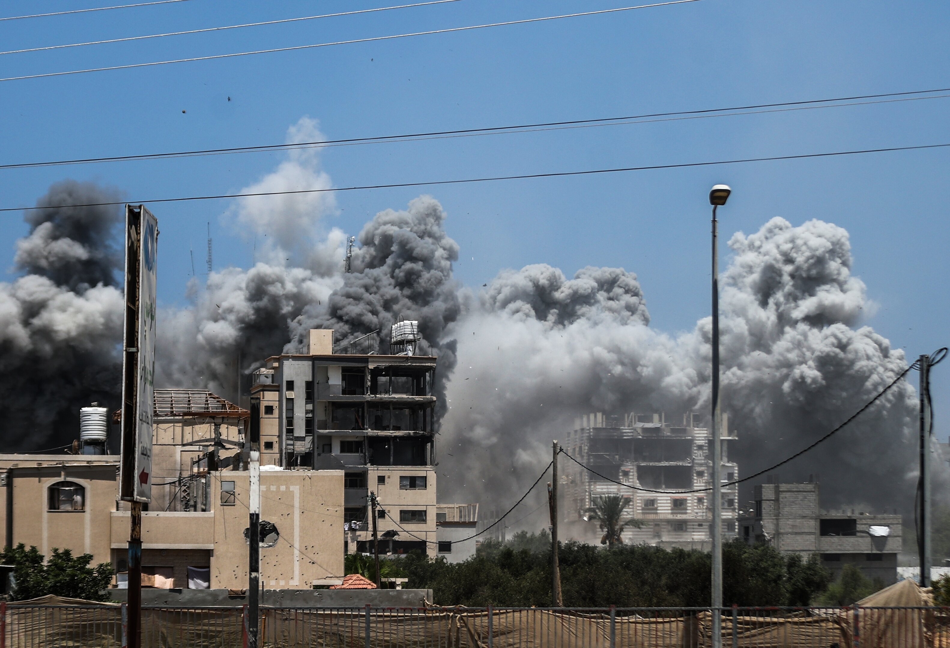 Smoke rises after Israeli warplanes launch airstrikes in the central Gaza Strip on July 20, 2024. (Photo by Ali Jadallah/Anadolu via Getty Images)