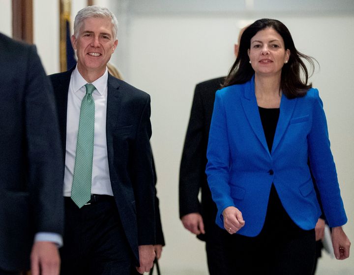 Former New Hampshire Sen. Kelly Ayotte accompanies then-Supreme Court Justice nominee Neil Gorsuch to a meeting on Capitol Hill in Washington, D.C., in 2017. 