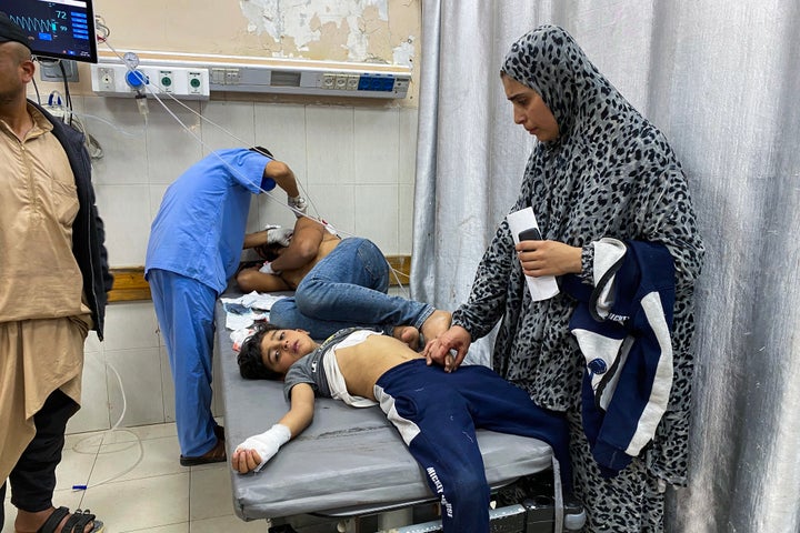 Wounded Palestinians receive treatment at Nasser Hospital in southern Gaza, on June 3, 2025, after Israeli forces opened fire on them as they made their way to an aid distribution site operating under a new, widely condemned U.S.-Israeli system.